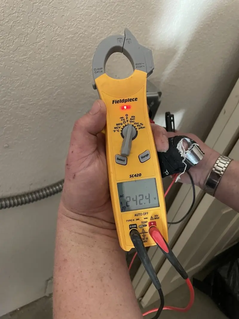Voltage testing with clamp meter during Generator Installation in Pooler